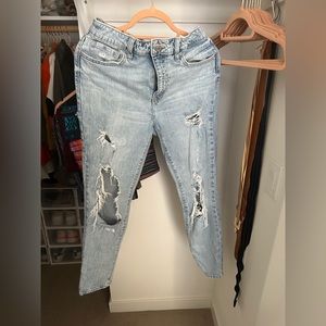 Ripped jeans. Light blue denim.